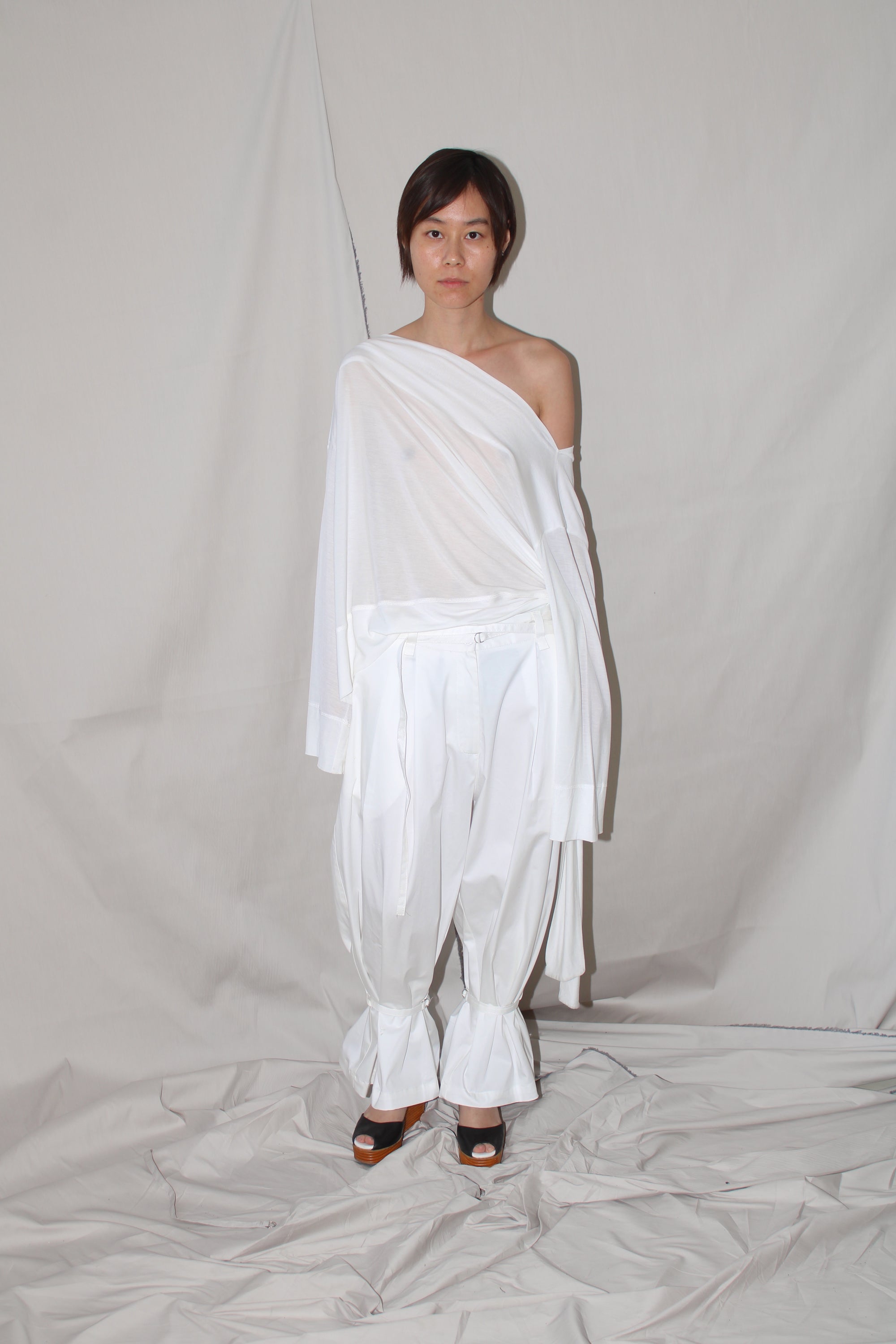 Pleated Pants With An Adjustable Hem Strap- White