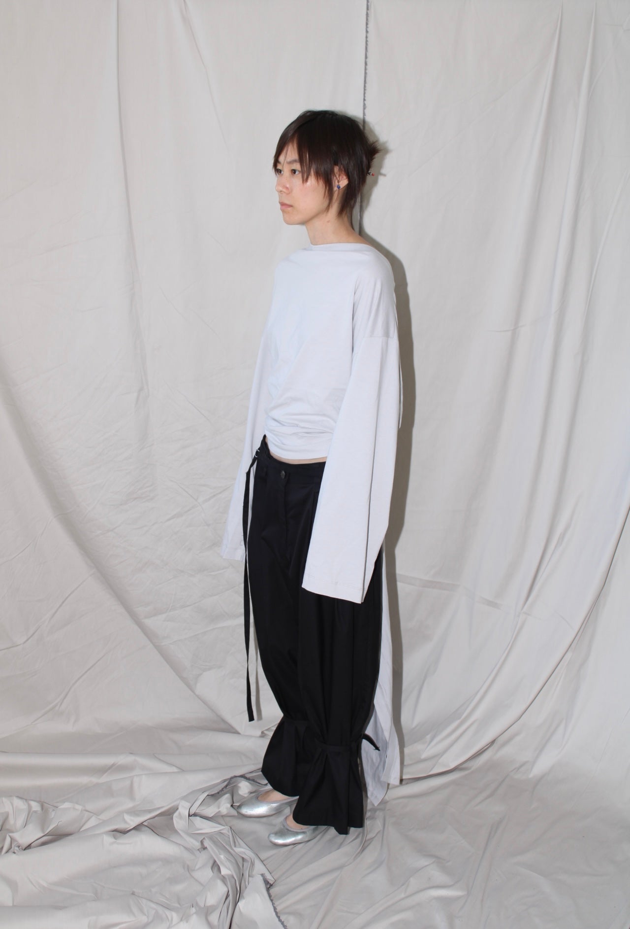 Pleated Pants With An Adjustable Hem Strap- Black