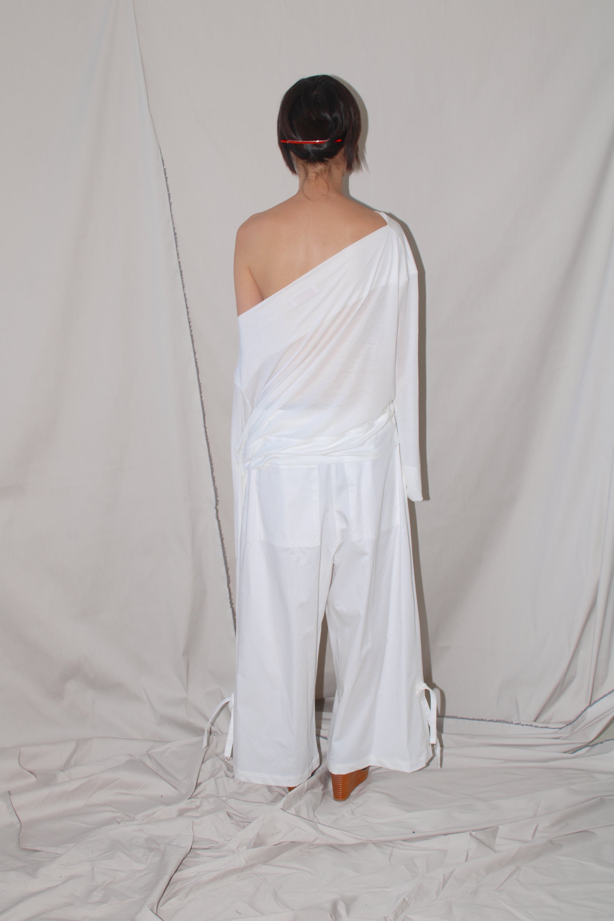 Pleated Pants With An Adjustable Hem Strap- White